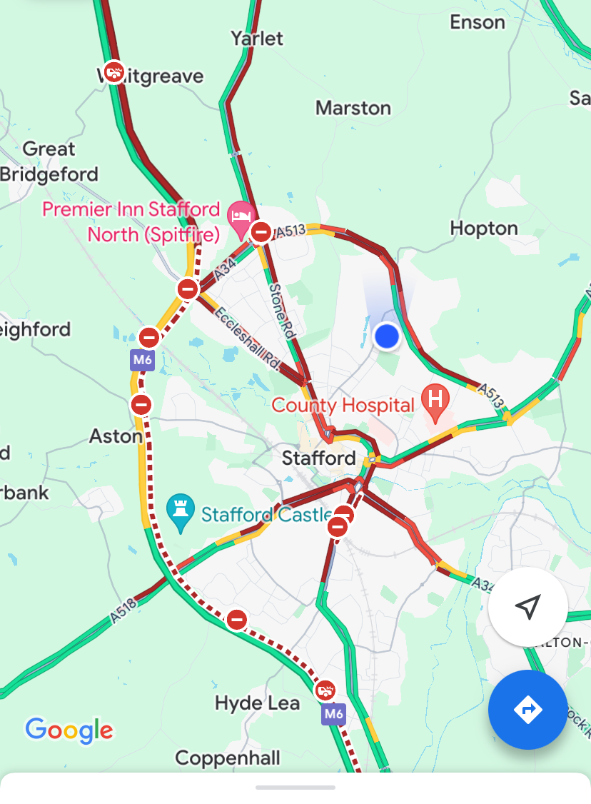 A map showing the motorway is closed. Red lines indicate the local town is gridlocked with diverted traffic.